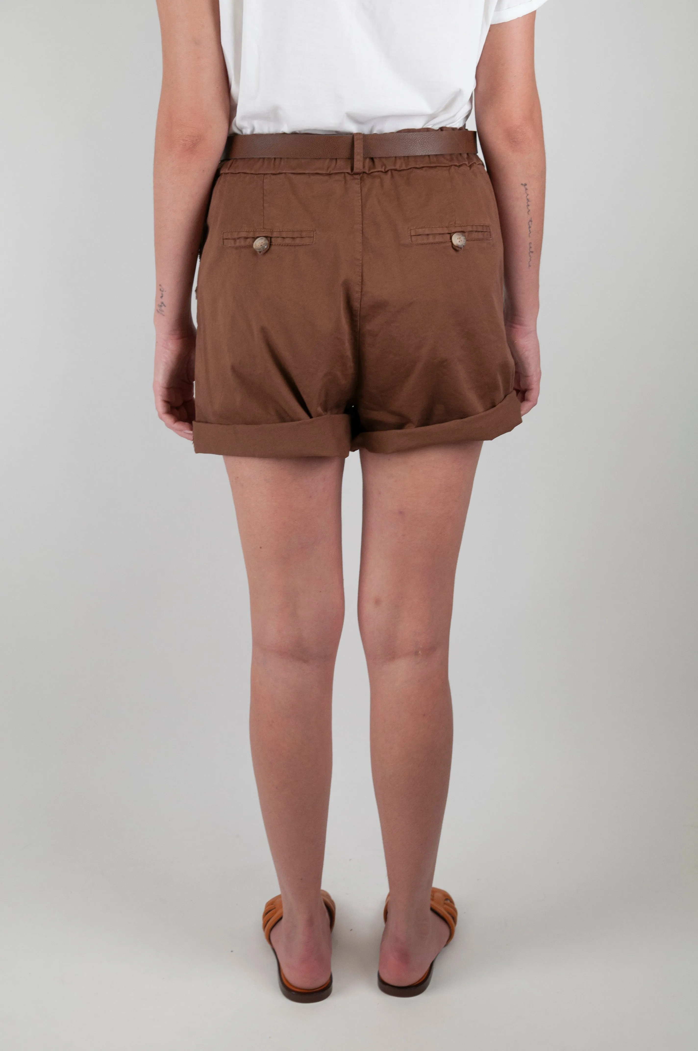 Motel Elastic Waist Shorts with Frayed Pocket.