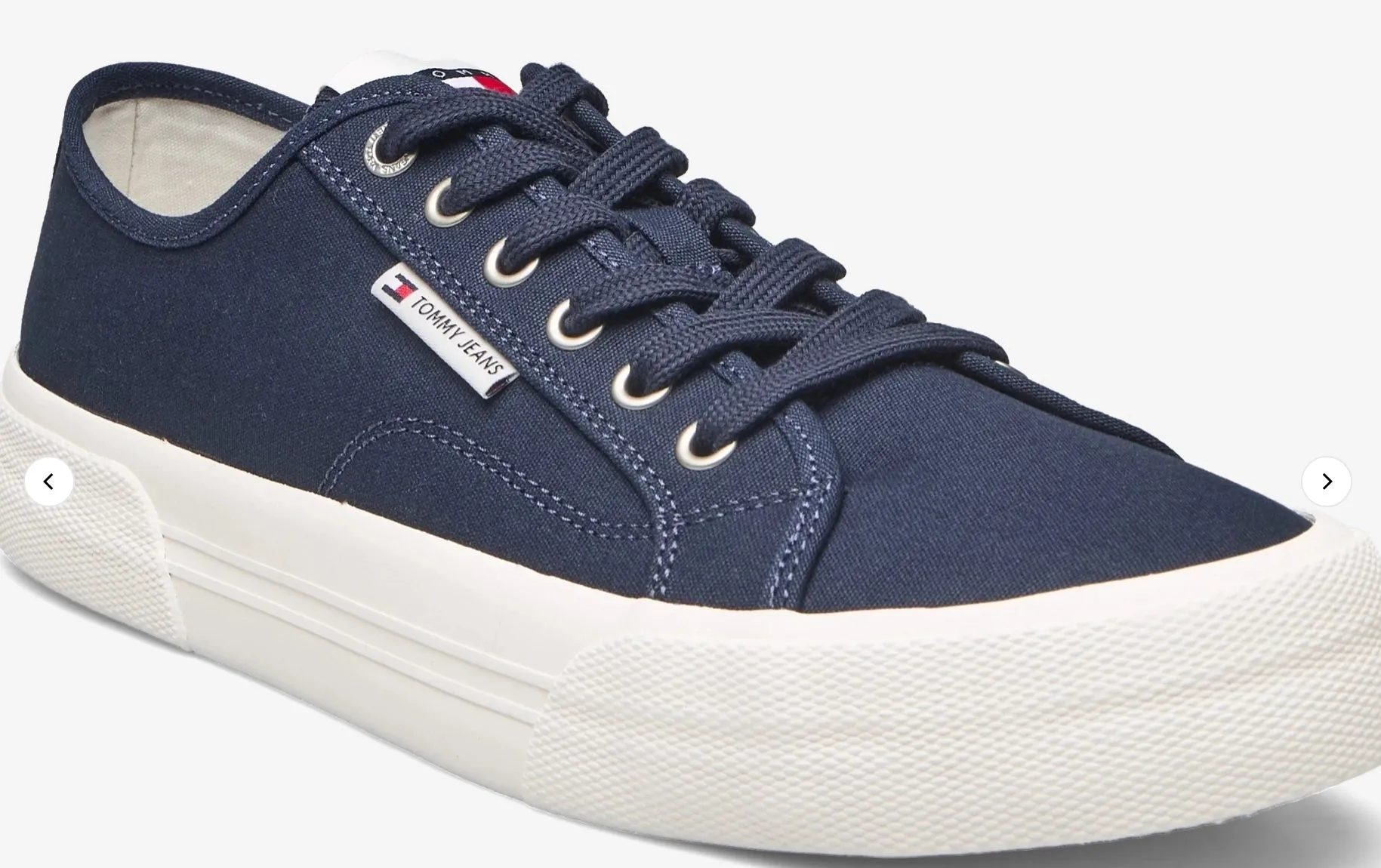 Blue canvas Tommy sneakers.