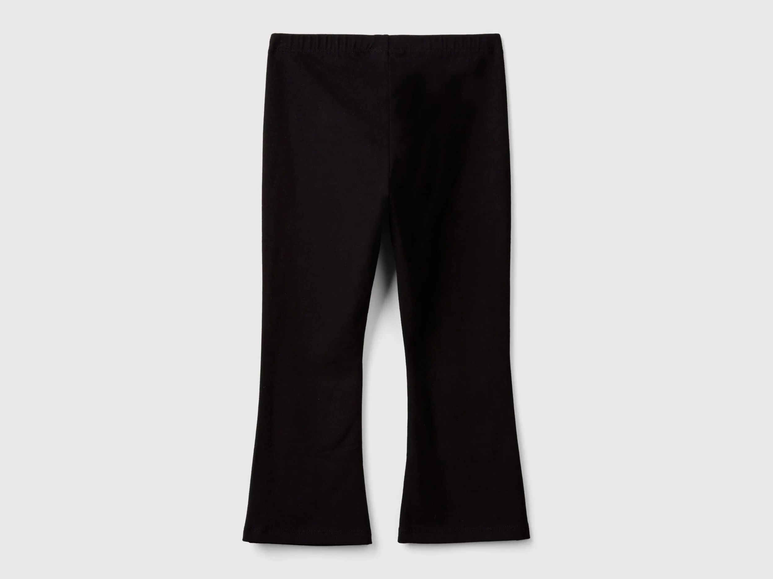 Stretch cotton black flared leggings by Benetton.