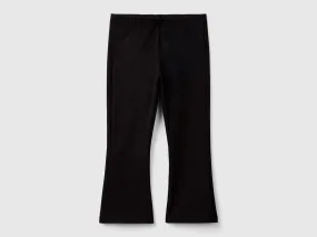 Stretch cotton black flared leggings by Benetton.